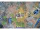 Bird's-eye view of a home and neighborhood, displaying the layout of properties and surrounding foliage at 2270 Old Concord Se Dr, Covington, GA 30016