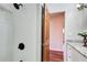 Bathroom featuring a tiled shower and granite countertop sink vanity at 2270 Old Concord Se Dr, Covington, GA 30016