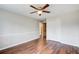 Bedroom featuring wood floors, closet, and access to another room at 2270 Old Concord Drive Se Dr, Covington, GA 30016