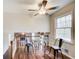 Sunny breakfast nook adjacent to the kitchen features a table and chairs with a lovely view at 2270 Old Concord Se Dr, Covington, GA 30016