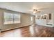 Spacious living room with hardwood floors, a ceiling fan, and ample natural light at 2270 Old Concord Se Dr, Covington, GA 30016