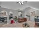 Open living room showcases high ceilings, a decorative archway and great natural light at 4804 Mceachern Way, Powder Springs, GA 30127