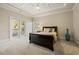 Bedroom with french doors leading to a small balcony at 9070 Waits Ferry Xing, Johns Creek, GA 30097