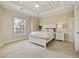 Bedroom featuring a ceiling fan, double windows, and white trim at 9070 Waits Ferry Xing, Johns Creek, GA 30097