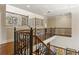 Hallway with decorative iron railing overlooking the floor below at 9070 Waits Ferry Xing, Johns Creek, GA 30097