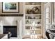 Office details including a fireplace, built in bookshelves, lighting and a decorative fireplace at 9070 Waits Ferry Xing, Johns Creek, GA 30097