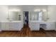 Bathroom featuring dual vanities with a connecting hallway in the middle at 2650 Peachtree Battle Nw Pl, Atlanta, GA 30327