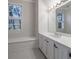 Bathroom vanity and tiled flooring at 2650 Peachtree Battle Nw Pl, Atlanta, GA 30327