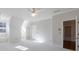 Spacious bedroom featuring a ceiling fan, neutral tones, and natural light from the window at 2650 Peachtree Battle Nw Pl, Atlanta, GA 30327