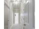 Hallway with doors, white trim and neutral carpet at 2650 Peachtree Battle Nw Pl, Atlanta, GA 30327