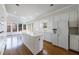 Bright kitchen with an island, white cabinetry, and stainless steel appliances at 2650 Peachtree Battle Nw Pl, Atlanta, GA 30327