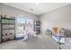 bedroom featuring a window, gray carpet and a play tent at 2066 Charcoal Ives Rd, Lawrenceville, GA 30045