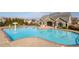 Community pool with mushroom water feature and ample room for swimming, plus nearby playground at 2066 Charcoal Ives Rd, Lawrenceville, GA 30045