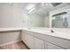 Bathroom vanity with double sinks, large mirror, and walk-in shower at 3330 Valley Vista Se Rd, Smyrna, GA 30080