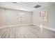 Bright bedroom featuring wood flooring and plenty of natural light at 3330 Valley Vista Se Rd, Smyrna, GA 30080