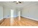 Bright bedroom with ceiling fan, hardwood floors, and large walk-in closet at 3330 Valley Vista Se Rd, Smyrna, GA 30080