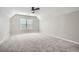 Attic bedroom with gray carpet, a window, and a slanted ceiling at 3330 Valley Vista Se Rd, Smyrna, GA 30080