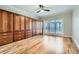 Bedroom featuring wall to wall custom wood cabinetry and a large picture window at 3330 Valley Vista Se Rd, Smyrna, GA 30080