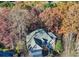 An elevated view of a traditional home featuring well-maintained landscaping and an attached two-car garage at 3330 Valley Vista Se Rd, Smyrna, GA 30080