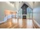 Bright living room featuring hardwood floors, a fireplace and vaulted ceilings at 3330 Valley Vista Se Rd, Smyrna, GA 30080