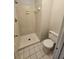 This bathroom features white tile, a shower, a toilet and white grout at 400 Prince Of Wales, Stone Mountain, GA 30083