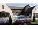 Spacious backyard featuring a pristine pool, outdoor seating area, and lush landscaping for outdoor enjoyment at 1580 Mayfield Rd, Alpharetta, GA 30009
