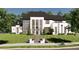Contemporary white two-story home with black window frames, manicured lawn, and a paved walkway to the front door at 1580 Mayfield Rd, Alpharetta, GA 30009