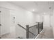 Hallway with staircase and views to adjacent rooms at 1818 Lacebark Elm Way, Lawrenceville, GA 30045