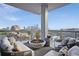 Cozy balcony features comfortable seating, a fire pit, and stunning city views at 3107 Peachtree Ne Rd # 1005, Atlanta, GA 30305