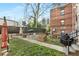 Cozy backyard space featuring a stone patio, seating area, and lush green landscaping at 323 3Rd Ne St # 5, Atlanta, GA 30308