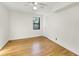 Light-filled bedroom with hardwood floors, a ceiling fan, and a window at 323 3Rd Ne St # 5, Atlanta, GA 30308