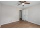 Bedroom featuring fan and closet doors at 1010 James Madison Ct, Mcdonough, GA 30253