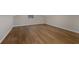 This is a finished room with hardwood floors and white trim at 1010 James Madison Ct, Mcdonough, GA 30253