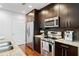 Well-equipped kitchen featuring granite counters, stainless steel appliances, and ample cabinet space at 1080 Peachtree Ne St # 2006, Atlanta, GA 30309