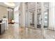 Bright lobby entrance with tiled floors, large windows, and contemporary design at 1080 Peachtree Ne St # 2006, Atlanta, GA 30309