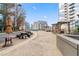 Community rooftop pool and lounge area with comfortable seating and city views at 1080 Peachtree Ne St # 2006, Atlanta, GA 30309