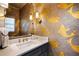 Powder room featuring decorative wallpaper and elegant fixtures at 3063 Peachtree Ne Dr, Atlanta, GA 30305