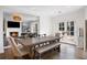 Dining area with french doors, dining table and access to living room at 3063 Peachtree Ne Dr, Atlanta, GA 30305