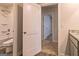 Bathroom featuring a toilet, sink, shower and door at 412 Barley Lot 86 Ct, Covington, GA 30014