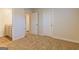 Bedroom featuring a closet, carpet and door at 412 Barley Lot 86 Ct, Covington, GA 30014