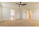 Spacious bedroom featuring a modern ceiling fan and neutral carpet, creating a bright and inviting space at 412 Barley Lot 86 Ct, Covington, GA 30014