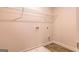 Clean laundry area with wire shelving and tile flooring, ready for appliances at 412 Barley Lot 86 Ct, Covington, GA 30014