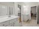 Dual sink bathroom with modern vanities and a clean layout; perfect for busy mornings at 310 Nw Brightfield Dr, Loganville, GA 30052