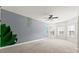 Spacious bonus room with ample natural light, offering versatile space for recreation or hobbies at 310 Nw Brightfield Dr, Loganville, GA 30052