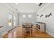 Light and airy dining room with French doors and stylish decor, perfect for Gathering meals at 310 Nw Brightfield Dr, Loganville, GA 30052