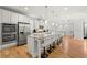 Beautiful kitchen with stainless appliances, granite countertops, and a breakfast bar that seats six at 310 Nw Brightfield Dr, Loganville, GA 30052