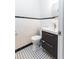 Traditional bathroom with black and white tile, white fixtures, and a new vanity at 430 Lindbergh Ne Dr # M1, Atlanta, GA 30305