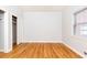 Empty bedroom with hardwood floors, a closet, and a bright window at 430 Lindbergh Ne Dr # M1, Atlanta, GA 30305