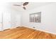 Bedroom featuring hardwood floors, two closets, and a ceiling fan at 430 Lindbergh Ne Dr # M1, Atlanta, GA 30305