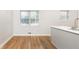 Bright dining room featuring hardwood floors, white trim, and large windows at 430 Lindbergh Ne Dr # M1, Atlanta, GA 30305